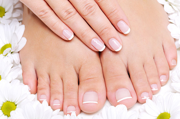 Stylish Lisa Nails & Spa Salon Services - Pure and Beauty female feet.
